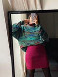 Maglione colorato base verde