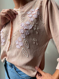 Cardigan rosa tutto decorato