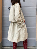 Trench color ghiaccio