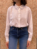 Camicia bianca con profilo azzurro