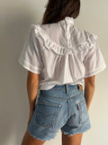 Camicia bianca con colletto arricciato
