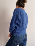 Maglione azzurro con rombi colorati
