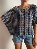 Blusa oversize blu ricamata