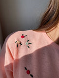 Maglione rosa con roselline