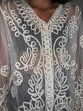 Camicia bianca trasparente con ricami