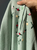 Maglione verde acqua con roselline