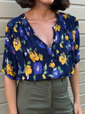 Camicia blu fiori gialli