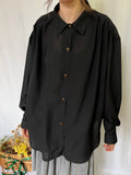 Camicia nera semitrasparente