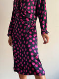Abito di seta a pois fuxia