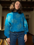Maglione ottanio luccicante