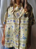 Camicia di seta beige fiori blu