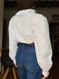 Camicia bianca con colletto froufrou