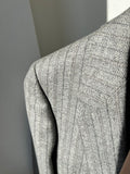 Completo di lana grigio righina