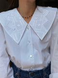 Camicia bianca con maxi colletto
