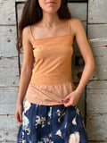 Top di seta color pesca